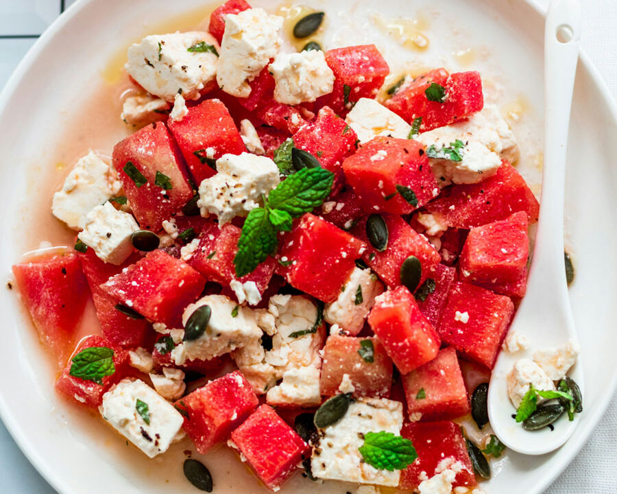 watermelon wedges and feta cheese recipe on a white plate